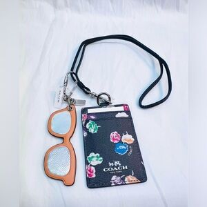 Coach lanyard with sunglass keychain